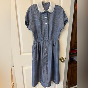 Vintage 1950s era classic women’s dress with pockets and heart polka dots